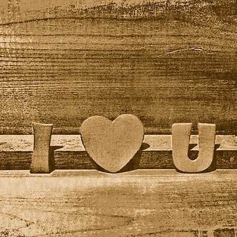 Wooden symbols, spelling out "I love you"